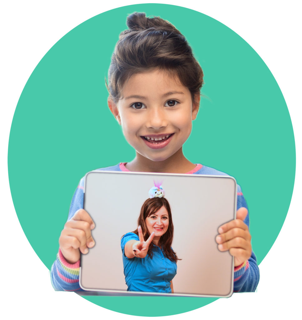 Young latina girl showing a tablet with Profesora Mary smiling and showing the peace sign on screen